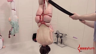 Anal masochist hung upside down and humiliated